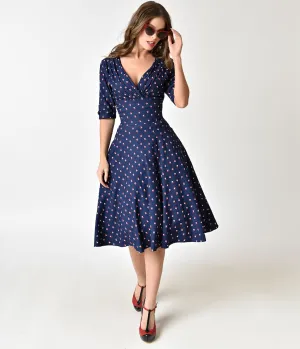 Unique Vintage 1950s Navy & Windmill Print Delores Swing Dress with Sleeves